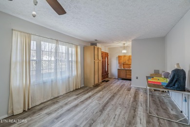 Come and see this beautiful lakefront one-level home on two on Lake Tansi Village Country Club in Tennessee - for sale on GolfHomes.com, golf home, golf lot