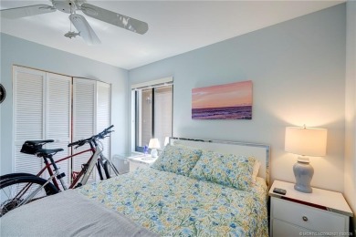 Enjoy breathtaking panoramic views of the golf course and lake on Ocean Club At the Hutchinson Island Beach Resort in Florida - for sale on GolfHomes.com, golf home, golf lot