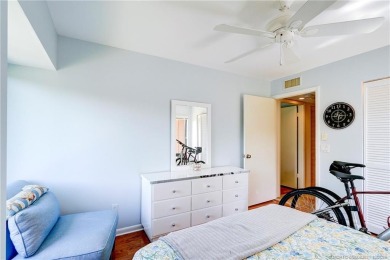 Enjoy breathtaking panoramic views of the golf course and lake on Ocean Club At the Hutchinson Island Beach Resort in Florida - for sale on GolfHomes.com, golf home, golf lot