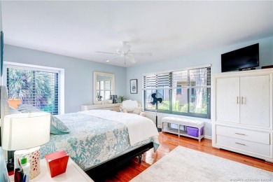 Enjoy breathtaking panoramic views of the golf course and lake on Ocean Club At the Hutchinson Island Beach Resort in Florida - for sale on GolfHomes.com, golf home, golf lot