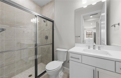 Enjoy low-maintenance, resort-style living in this beautifully on River Hall Country Club in Florida - for sale on GolfHomes.com, golf home, golf lot