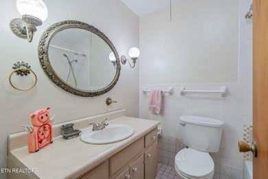 Come and see this beautiful lakefront one-level home on two on Lake Tansi Village Country Club in Tennessee - for sale on GolfHomes.com, golf home, golf lot