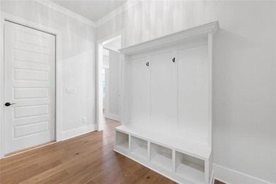 Timeless design, modern comfort, and the privacy of an oversized on Harbor Club Golf and Country Club in Georgia - for sale on GolfHomes.com, golf home, golf lot