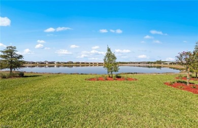 Enjoy low-maintenance, resort-style living in this beautifully on River Hall Country Club in Florida - for sale on GolfHomes.com, golf home, golf lot