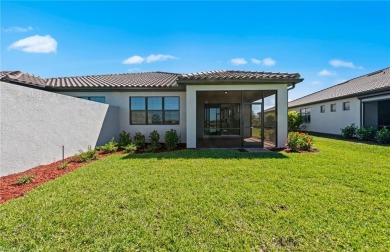 Enjoy low-maintenance, resort-style living in this beautifully on River Hall Country Club in Florida - for sale on GolfHomes.com, golf home, golf lot