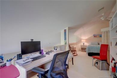 Enjoy breathtaking panoramic views of the golf course and lake on Ocean Club At the Hutchinson Island Beach Resort in Florida - for sale on GolfHomes.com, golf home, golf lot