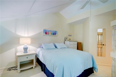 Enjoy breathtaking panoramic views of the golf course and lake on Ocean Club At the Hutchinson Island Beach Resort in Florida - for sale on GolfHomes.com, golf home, golf lot