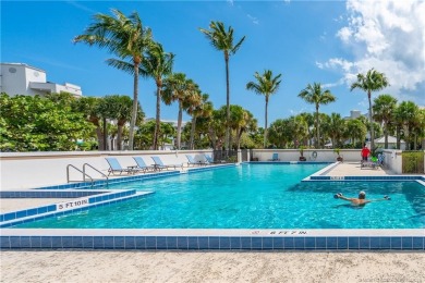 Enjoy breathtaking panoramic views of the golf course and lake on Ocean Club At the Hutchinson Island Beach Resort in Florida - for sale on GolfHomes.com, golf home, golf lot
