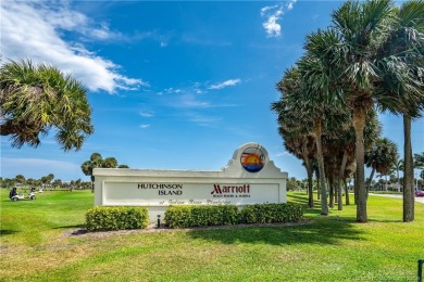 Enjoy breathtaking panoramic views of the golf course and lake on Ocean Club At the Hutchinson Island Beach Resort in Florida - for sale on GolfHomes.com, golf home, golf lot