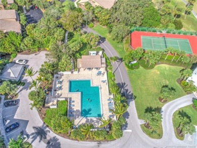 Enjoy breathtaking panoramic views of the golf course and lake on Ocean Club At the Hutchinson Island Beach Resort in Florida - for sale on GolfHomes.com, golf home, golf lot