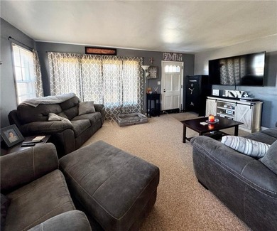 Welcome home to this inviting two-bedroom, two-bath property on Redwood Falls Golf Club in Minnesota - for sale on GolfHomes.com, golf home, golf lot