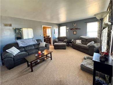 Welcome home to this inviting two-bedroom, two-bath property on Redwood Falls Golf Club in Minnesota - for sale on GolfHomes.com, golf home, golf lot