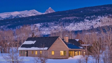 This stunning property features 4 bdrms, 4.5 bathrooms, and an on Teton Reserve in Idaho - for sale on GolfHomes.com, golf home, golf lot