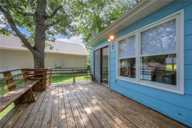 This quaint and charming lakefront bungalow offers a peaceful on Linn Valley Lakes - Deer Trace Golf Course in Kansas - for sale on GolfHomes.com, golf home, golf lot