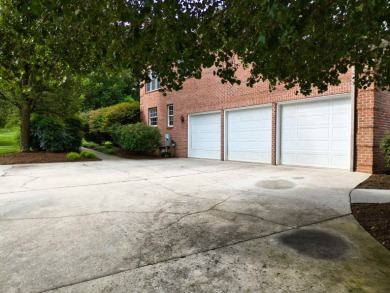 This Stately, all brick colonial is situated on over 1/2 acre on Pete Dye River Course of Virginia Tech in Virginia - for sale on GolfHomes.com, golf home, golf lot