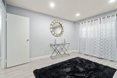 Beautifully renovated 2nd floor Condo is a must see.  White on Kings Point Golf - Executive in Florida - for sale on GolfHomes.com, golf home, golf lot