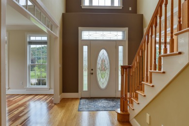 This Stately, all brick colonial is situated on over 1/2 acre on Pete Dye River Course of Virginia Tech in Virginia - for sale on GolfHomes.com, golf home, golf lot