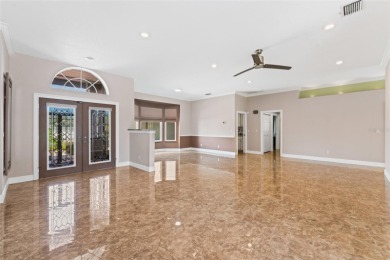Looking for the perfect home in Sun City Center? This one truly on Caloosa Greens Executive Golf Course in Florida - for sale on GolfHomes.com, golf home, golf lot