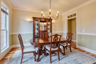 This Stately, all brick colonial is situated on over 1/2 acre on Pete Dye River Course of Virginia Tech in Virginia - for sale on GolfHomes.com, golf home, golf lot