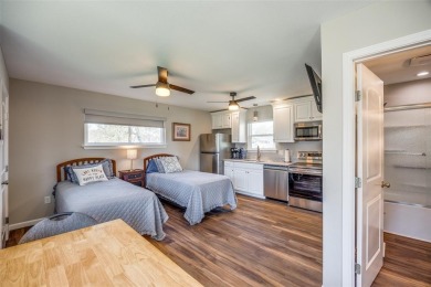Gorgeous lakefront property on 2 beautiful wooded lots with a on Lake Kiowa Golf Course in Texas - for sale on GolfHomes.com, golf home, golf lot