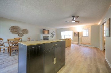 This quaint and charming lakefront bungalow offers a peaceful on Linn Valley Lakes - Deer Trace Golf Course in Kansas - for sale on GolfHomes.com, golf home, golf lot