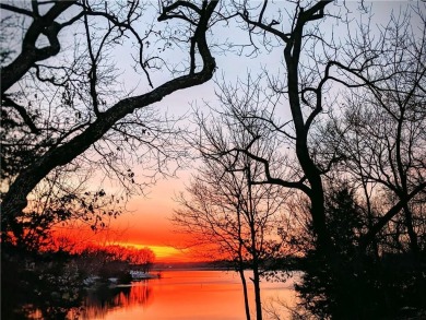 This quaint and charming lakefront bungalow offers a peaceful on Linn Valley Lakes - Deer Trace Golf Course in Kansas - for sale on GolfHomes.com, golf home, golf lot