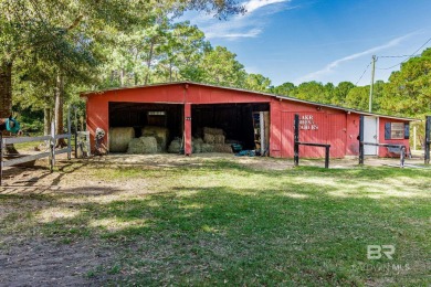 Welcome to 113 Wildwood Drive, a well-crafted home located in on Lake Forest Yacht and Country Club in Alabama - for sale on GolfHomes.com, golf home, golf lot