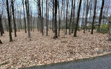 BEAUTIFULLY WOODED LOT IN UPSCALE SUBDIVISION IN THE MOUNTAINS on Mountain Harbour Golf Club in North Carolina - for sale on GolfHomes.com, golf home, golf lot