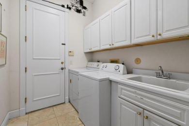 This home is in Old Trail located in Ranch Colony, a gated on Jonathans Landing At Old Trail  in Florida - for sale on GolfHomes.com, golf home, golf lot