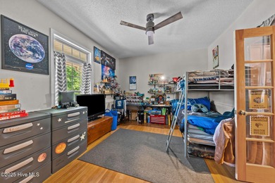 Welcome to 109 Sweetbriar Court, a gracious blend of timeless on Seven Lakes Country Club in North Carolina - for sale on GolfHomes.com, golf home, golf lot