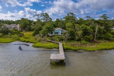 Nestled in a private setting at the end of a cul-de-sac, this on The Country Club of the Crystal Coast in North Carolina - for sale on GolfHomes.com, golf home, golf lot