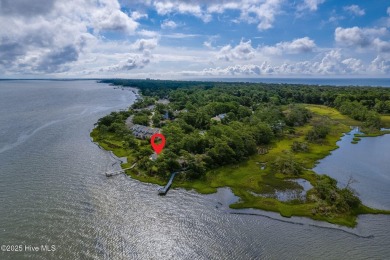 Nestled in a private setting at the end of a cul-de-sac, this on The Country Club of the Crystal Coast in North Carolina - for sale on GolfHomes.com, golf home, golf lot