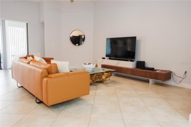 Golf, Gather, and Get Away, Right at Home in ChampionsGate on The Oasis Club at Champions Gate in Florida - for sale on GolfHomes.com, golf home, golf lot