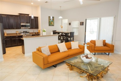 Golf, Gather, and Get Away, Right at Home in ChampionsGate on The Oasis Club at Champions Gate in Florida - for sale on GolfHomes.com, golf home, golf lot