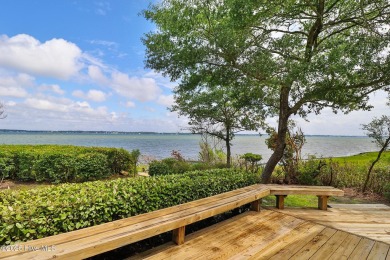 Nestled in a private setting at the end of a cul-de-sac, this on The Country Club of the Crystal Coast in North Carolina - for sale on GolfHomes.com, golf home, golf lot