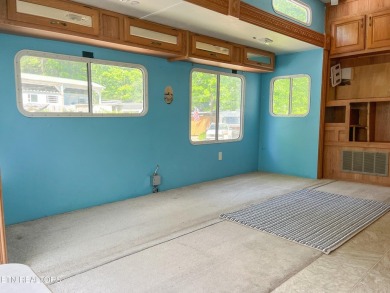 Price improvement!  Motivated sellers!  YOU OWN THE LOT!!  With on Lake Tansi Village Country Club in Tennessee - for sale on GolfHomes.com, golf home, golf lot
