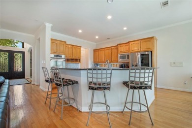 Welcome to this beautifully crafted residence nestled in the on Hackberry Creek Country Club in Texas - for sale on GolfHomes.com, golf home, golf lot