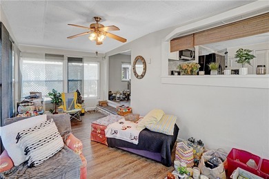 Charming 2/2 with a carport. Features include new windows, rain on Barefoot Bay Golf Course in Florida - for sale on GolfHomes.com, golf home, golf lot