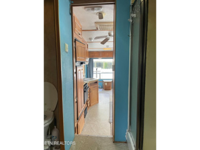 Price improvement!  Motivated sellers!  YOU OWN THE LOT!!  With on Lake Tansi Village Country Club in Tennessee - for sale on GolfHomes.com, golf home, golf lot