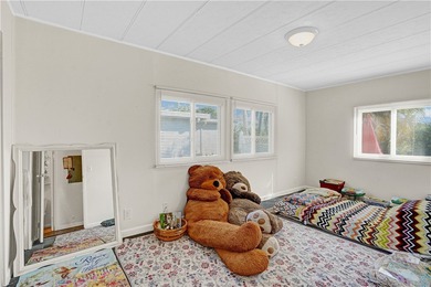 Charming 2/2 with a carport. Features include new windows, rain on Barefoot Bay Golf Course in Florida - for sale on GolfHomes.com, golf home, golf lot