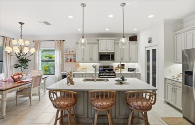 Experience resort-style living in this beautiful White Star on Boca Royale Golf and Country Club in Florida - for sale on GolfHomes.com, golf home, golf lot