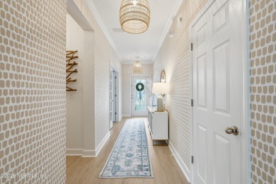 Welcome to 201 Glenwood Street, a beautifully updated home in on Palm Valley Golf Club in Florida - for sale on GolfHomes.com, golf home, golf lot