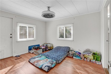 Charming 2/2 with a carport. Features include new windows, rain on Barefoot Bay Golf Course in Florida - for sale on GolfHomes.com, golf home, golf lot