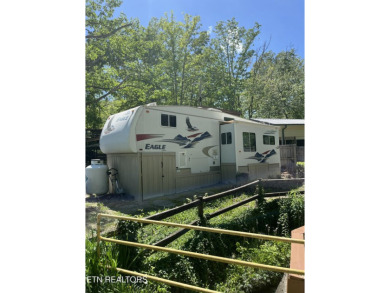 Price improvement!  Motivated sellers!  YOU OWN THE LOT!!  With on Lake Tansi Village Country Club in Tennessee - for sale on GolfHomes.com, golf home, golf lot