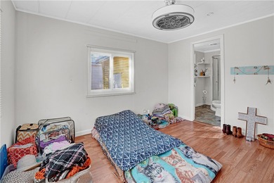 Charming 2/2 with a carport. Features include new windows, rain on Barefoot Bay Golf Course in Florida - for sale on GolfHomes.com, golf home, golf lot