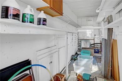 Charming 2/2 with a carport. Features include new windows, rain on Barefoot Bay Golf Course in Florida - for sale on GolfHomes.com, golf home, golf lot