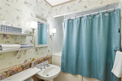 Introducing a spacious 4 bed, 2 bath home ideally situated just on Madison Country Club in Ohio - for sale on GolfHomes.com, golf home, golf lot