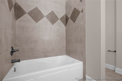 Discover luxury living behind the gates of the prestigious on Anderson Creek Golf Club in North Carolina - for sale on GolfHomes.com, golf home, golf lot