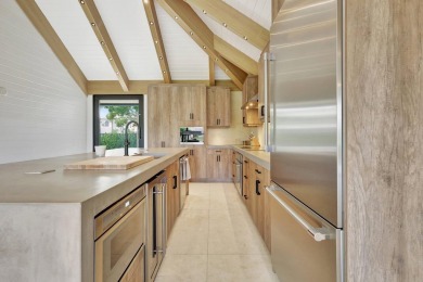 Welcome to an extraordinary residence that seamlessly blends on Palm Beach Polo and Country Club in Florida - for sale on GolfHomes.com, golf home, golf lot