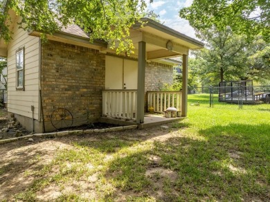 This beautifully maintained brick home is in a quite tree-shaded on White Bluff Resort - Old Course in Texas - for sale on GolfHomes.com, golf home, golf lot
